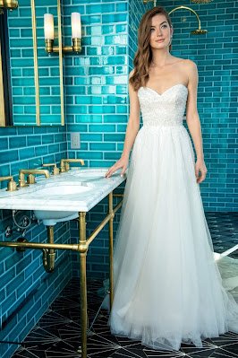 Enaura Bridal Strapless a-line Bridal Dress with beaded throughout